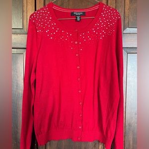 Central Park west red sweater